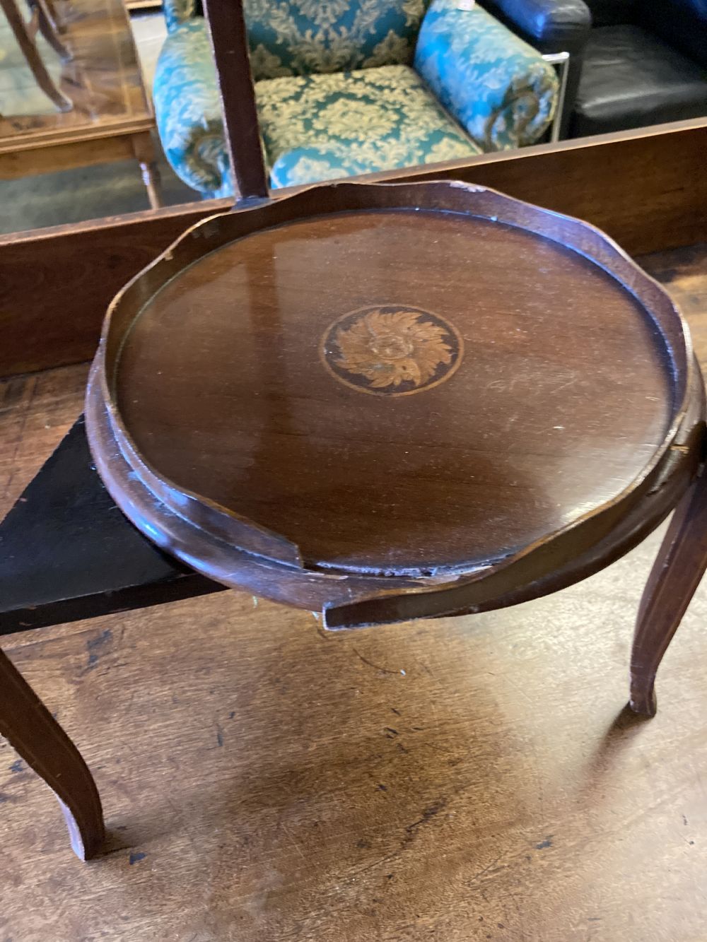 An Arts & Crafts ladder-back rush-seat elbow chair and an Edwardian inlaid mahogany three-tier cake stand (faults), 96cm high